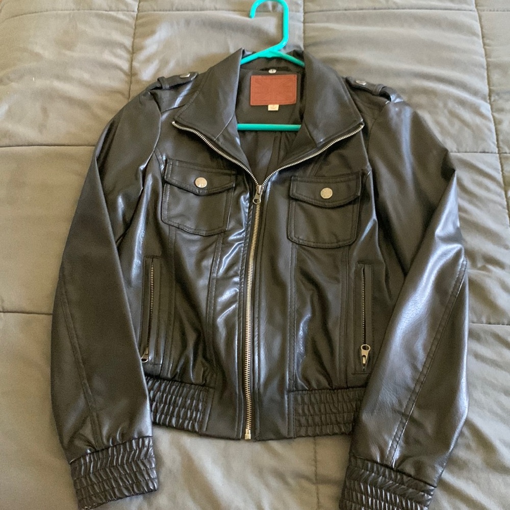 Miss London faux leather jacket. New w/o tags. Never worn. Women’s size M.